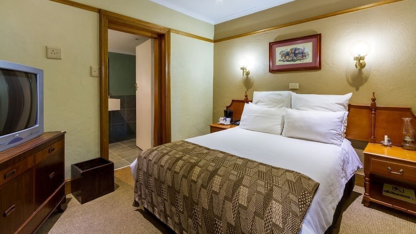 Imagen de la habitación del Hotel Numbi and Garden Suites. Foto 16