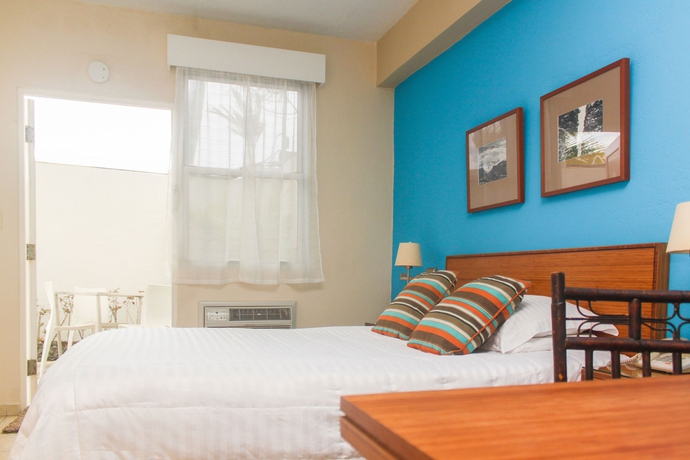 Imagen de la habitación del Hotel Numero Uno Beach House. Foto 9