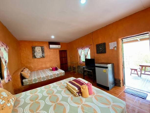 Imagen de la habitación del Hotel Numpubaandin Homestay. Foto 22