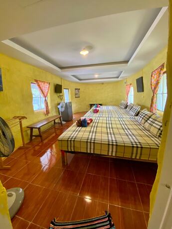 Imagen de la habitación del Hotel Numpubaandin Homestay. Foto 25