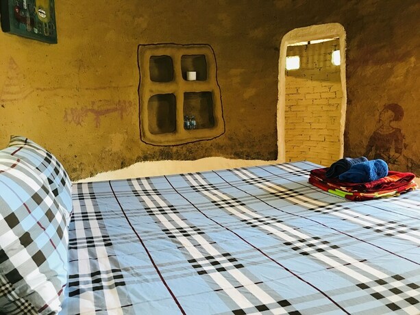 Imagen de la habitación del Hotel Numpubaandin Homestay. Foto 27