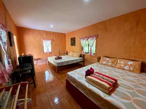 Imagen de la habitación del Hotel Numpubaandin Homestay. Foto 29