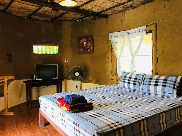 Imagen de la habitación del Hotel Numpubaandin Homestay. Foto 32