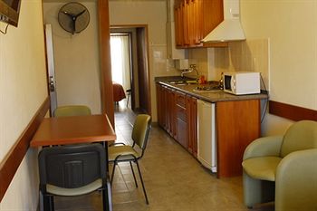 Imagen de la habitación del Hotel Nuna Ayni Departamentos. Foto 5