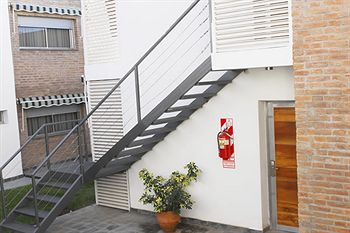 Imagen de los exteriores del Hotel Nuna Ayni Departamentos. Foto 11