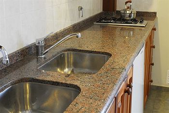 Imagen de la habitación del Hotel Nuna Ayni Departamentos. Foto 7