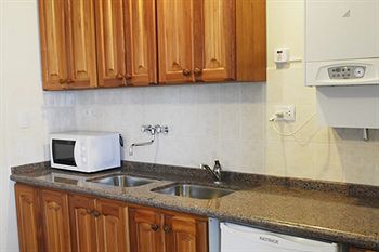 Imagen de la habitación del Hotel Nuna Ayni Departamentos. Foto 9