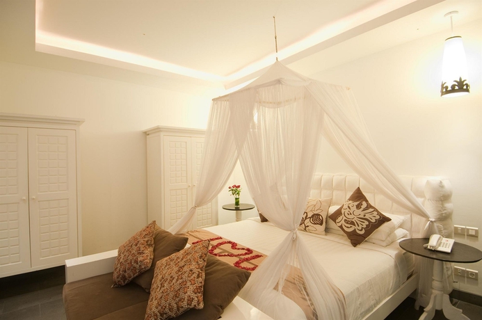 Imagen de la habitación del Hotel Nunia Boutique Villas. Foto 4