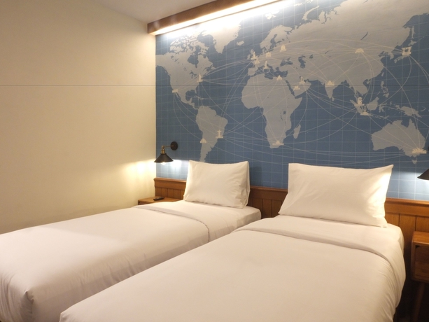 Imagen de la habitación del Hotel Nunia Inn Bandara Jakarta - Airport. Foto 8