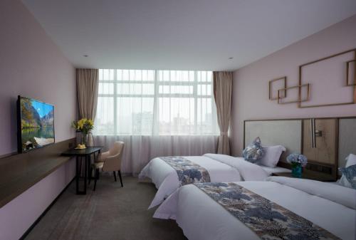 Imagen de la habitación del Hotel Nuohuating. Foto 4