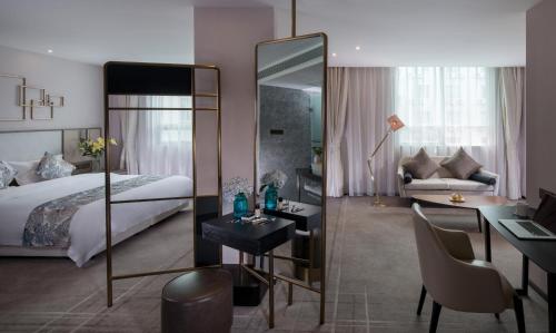 Imagen de la habitación del Hotel Nuohuating. Foto 7