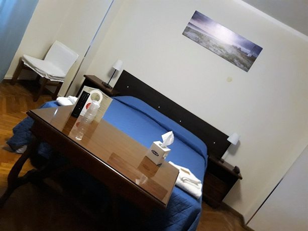 Imagen de la habitación del Hotel Nuova Italia. Foto 7