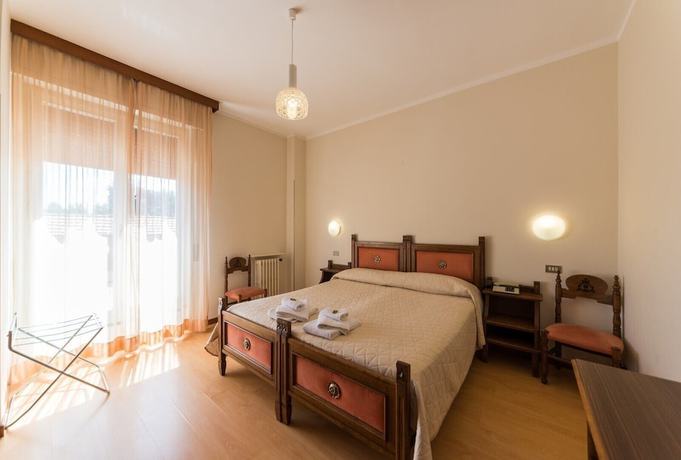 Imagen de la habitación del Hotel Nuova Italia. Foto 14