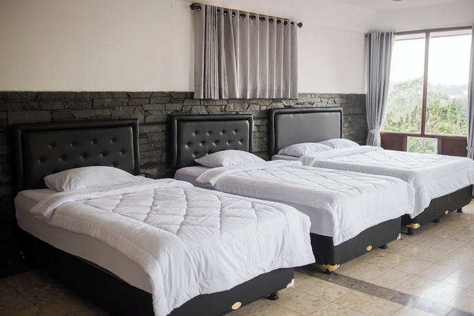 Imagen de la habitación del Hotel Nur Alam. Foto 1