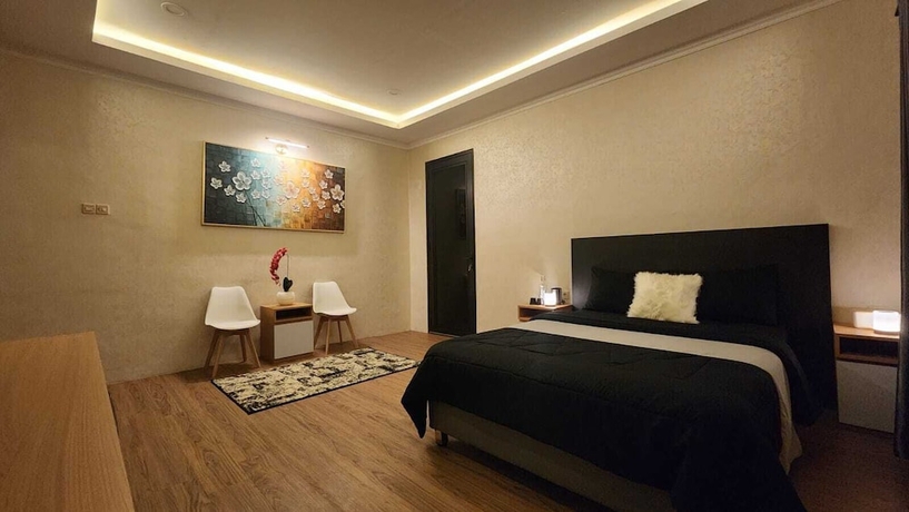 Imagen de la habitación del Hotel Nur Alam. Foto 2