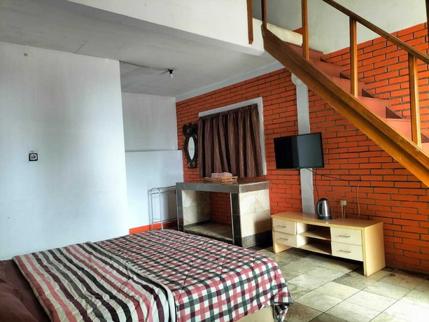 Imagen de la habitación del Hotel Nur Alam. Foto 5