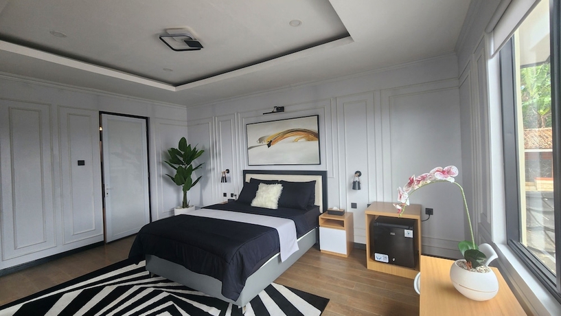 Imagen de la habitación del Hotel Nur Alam. Foto 6