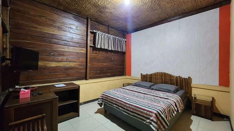 Imagen de la habitación del Hotel Nur Alam. Foto 11