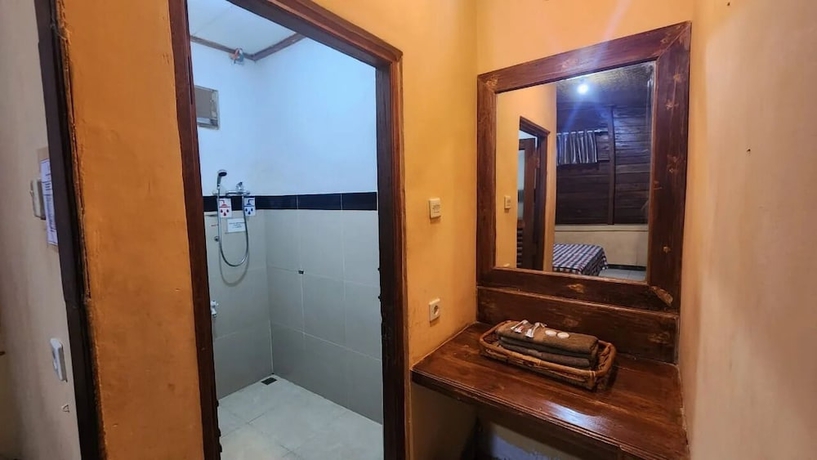 Imagen de la habitación del Hotel Nur Alam. Foto 13