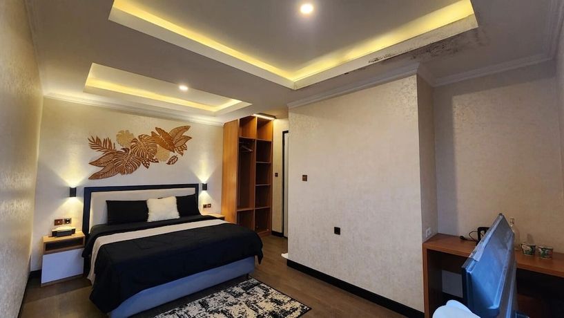 Imagen de la habitación del Hotel Nur Alam. Foto 14