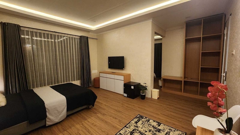Imagen de la habitación del Hotel Nur Alam. Foto 16