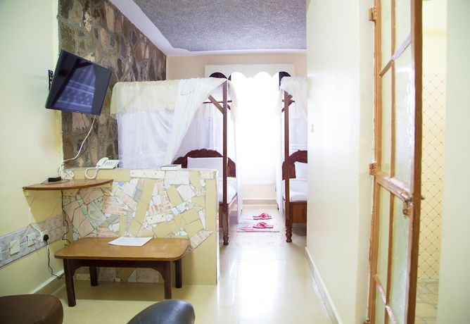 Imagen de la habitación del Hotel Nuru Palace. Foto 17