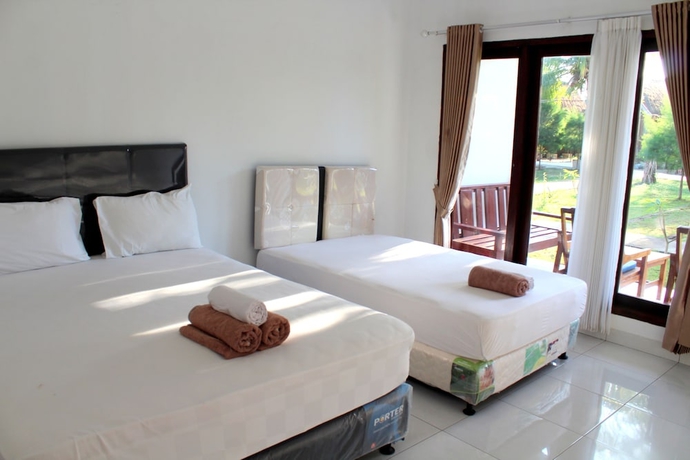 Imagen de la habitación del Hotel Nusa Indah Bungalows. Foto 2