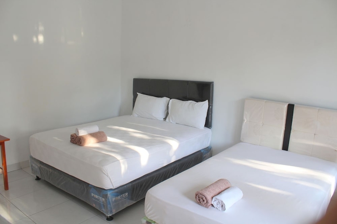 Imagen de la habitación del Hotel Nusa Indah Bungalows. Foto 3