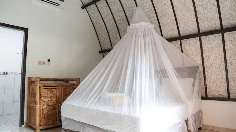 Imagen de la habitación del Hotel Nusa Indah Bungalows. Foto 6