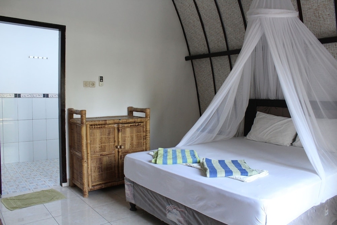 Imagen de la habitación del Hotel Nusa Indah Bungalows. Foto 7