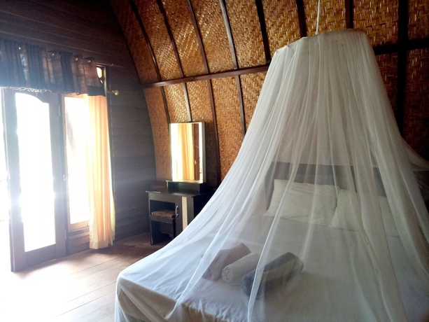 Imagen de la habitación del Hotel Nusa Indah Bungalows. Foto 9