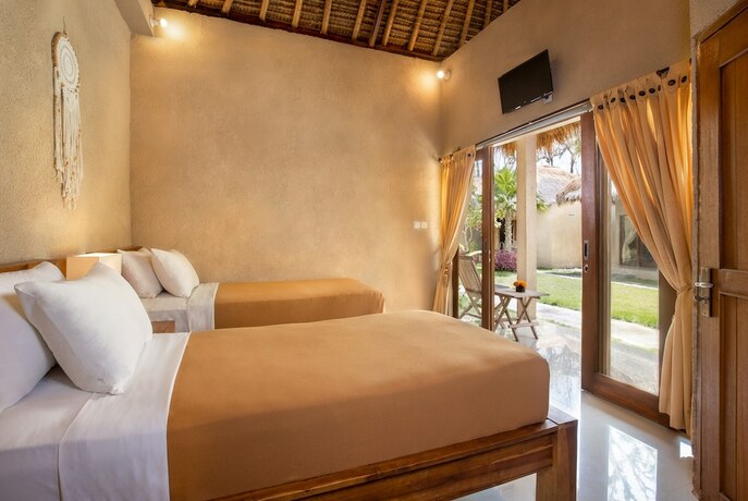 Imagen de la habitación del Hotel Nusa Majesty. Foto 22