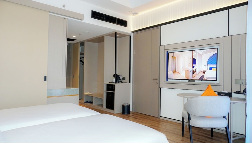 Imagen de la habitación del Hotel Nusatu by ARTOTEL - Semarang. Foto 2