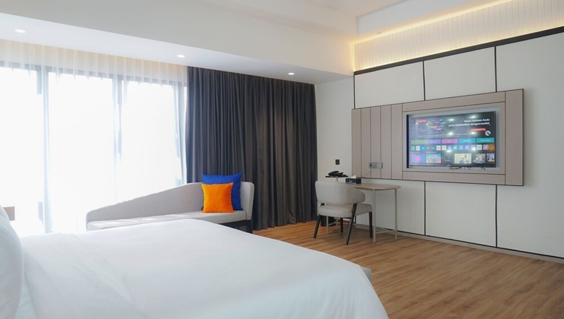 Imagen de la habitación del Hotel Nusatu by ARTOTEL - Semarang. Foto 7