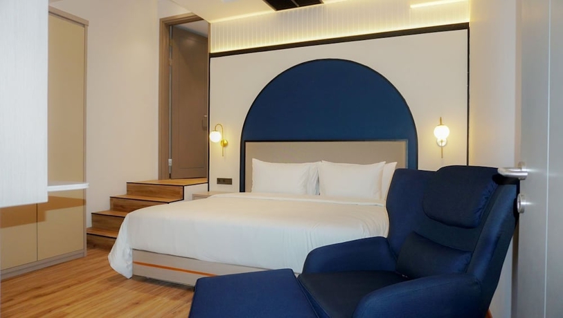 Imagen de la habitación del Hotel Nusatu by ARTOTEL - Semarang. Foto 11