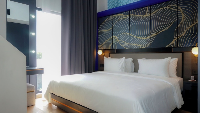 Imagen de la habitación del Hotel Nusatu by ARTOTEL - Semarang. Foto 13