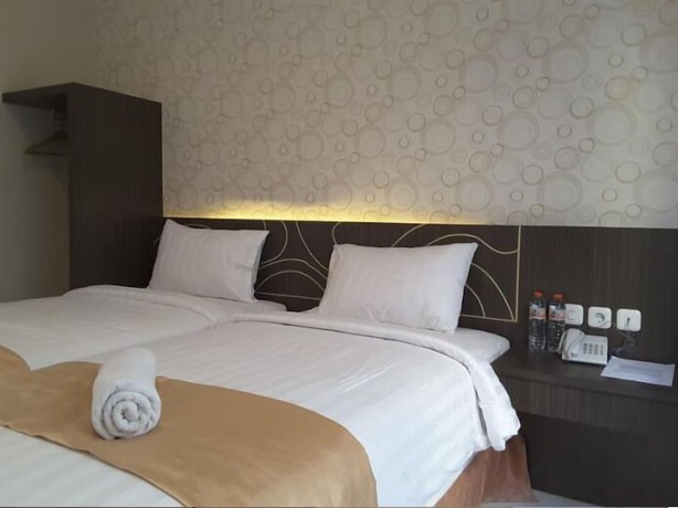 Imagen de la habitación del Hotel Nutana Lombok. Foto 14