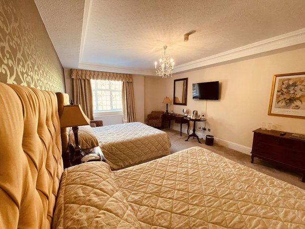 Imagen de la habitación del Hotel Nuthurst Grange Country House. Foto 10