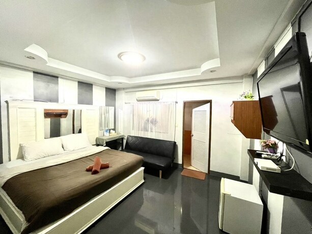 Imagen de la habitación del Hotel Nuttasit Apartment. Foto 17