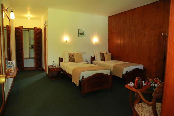 Imagen de la habitación del Hotel Nuwara Eliya Golf Club. Foto 8