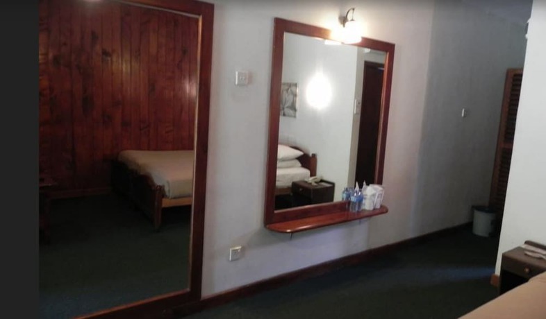Imagen de la habitación del Hotel Nuwara Eliya Golf Club. Foto 11