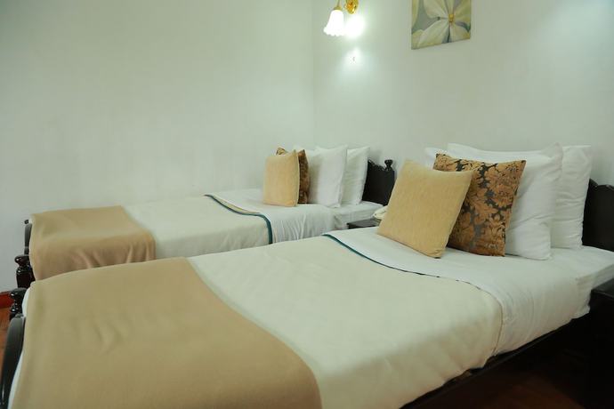 Imagen de la habitación del Hotel Nuwara Eliya Golf Club. Foto 15
