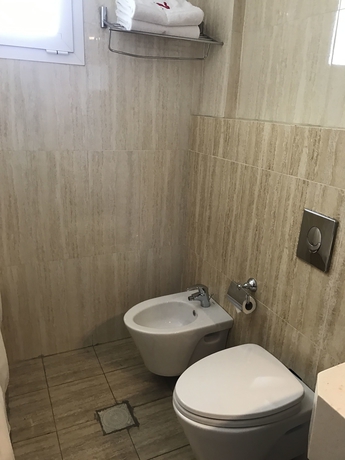 Imagen de la habitación del Hotel Ny Suites. Foto 6