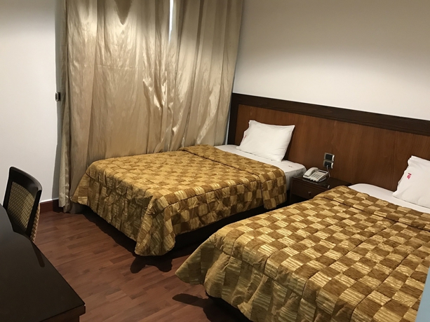 Imagen de la habitación del Hotel Ny Suites. Foto 10