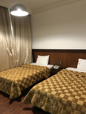 Imagen de la habitación del Hotel Ny Suites. Foto 11