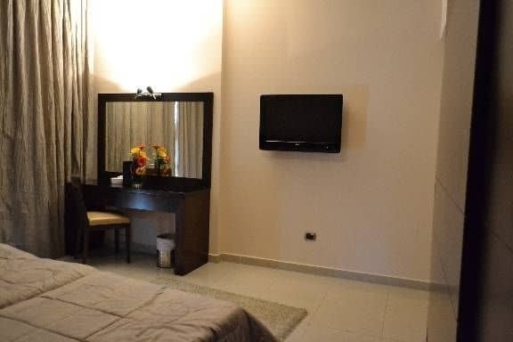 Imagen de la habitación del Hotel Ny Suites. Foto 14