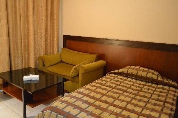 Imagen de la habitación del Hotel Ny Suites. Foto 16