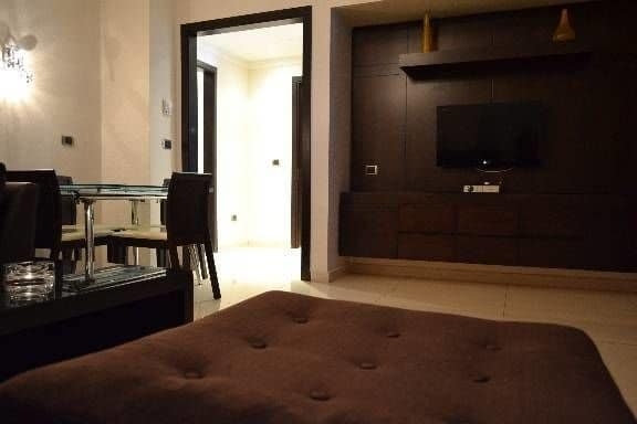 Imagen de la habitación del Hotel Ny Suites. Foto 17