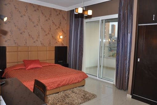 Imagen de la habitación del Hotel Ny Suites. Foto 18