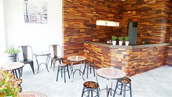 Imagen del bar/restaurante del Hotel Ny Th. Foto 3